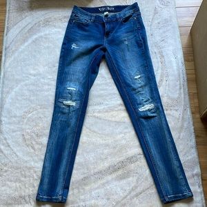 White House Black Market skinny jeans w/silver and white distressed stitching